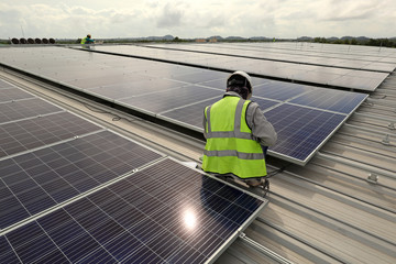 Poster - Technician Connecting Cable Solar Rooftop