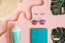 Top View Of Essential Modern Young Lady Or Girl On Vacations.Woman's Summer Holidays Accessories Composed On Pastel Color Background. Beach Fashion , Summer Concept. Trendy Colors.