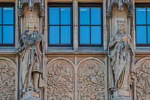 Wall Figures Of King And Queen Protected By Fishnet At Main Facade Of Justice Department In Magdeburg, Germany, Closeup, Details