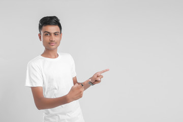 Wall Mural - young Indian man giving multiple expression.