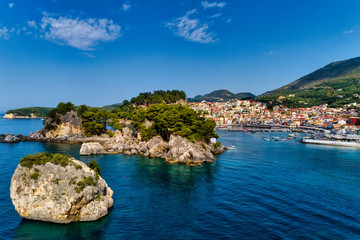 Aerial cityscape view of the coastal city of Parga, Greece during the Summer