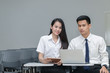 © kwanchaichaiudom - Students in uniform working and reading
