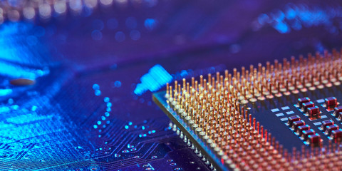 chip is highlighted with blue light. Technology background