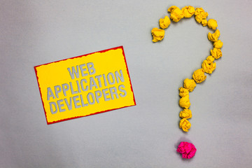 Writing note showing Web Application Developers. Business photo showcasing Internet programming experts Technology software Red bordered yellow sticky note yellow paper lumps form question mark
