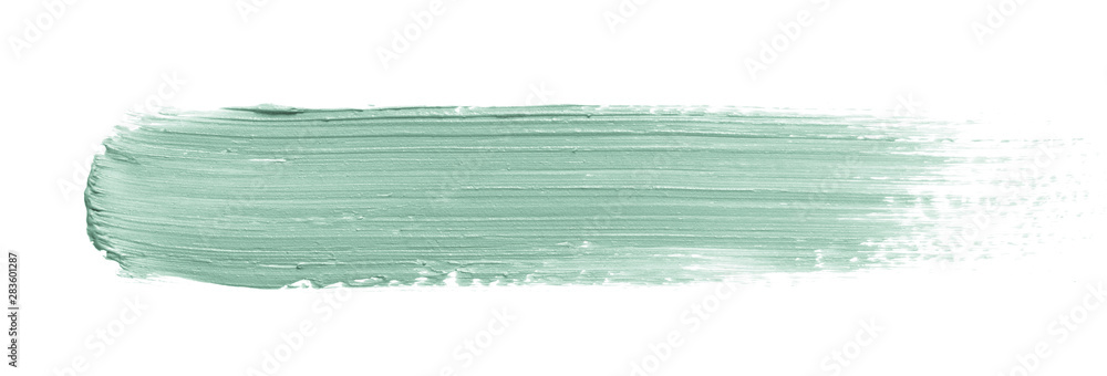 Color corrector stroke isolated on white background. Green color correcting concealer cream smudge smear swatch sample. Makeup base creamy texture - obrazy, fototapety, plakaty 