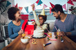 © Mediteraneo - Happy family celebrating a birthday together at home