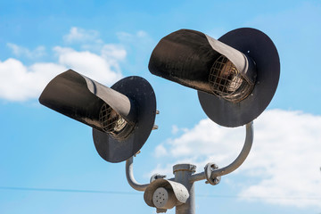 Semaphore signal at a railway crossing. Railway level crossing, semaphore, stop sign, road intersection