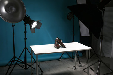 Shooting of men's shoes for product promotion in photo studio