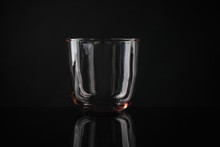 Elegant Empty Colorful Whiskey Glass On Black Background