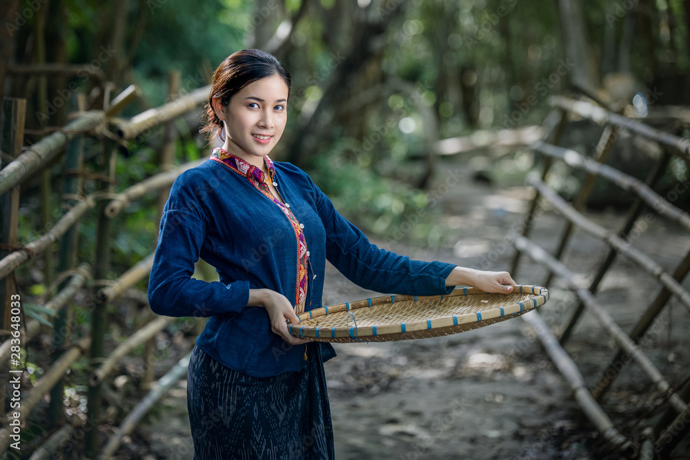 Beautiful rural asian woman in traditional costume Stock Photo | Adobe ...