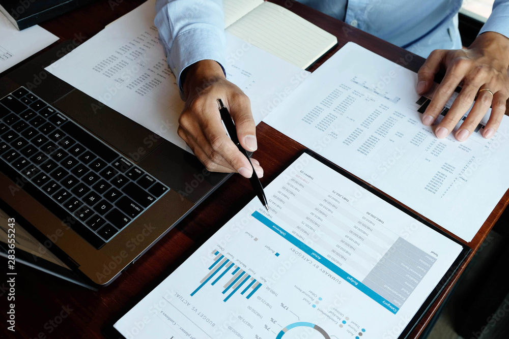 Businessmen, financial accountants, planners, work, planning, ideas in the office, using the tools and calculators to work