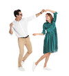 © New Africa - Beautiful young couple dancing on white background