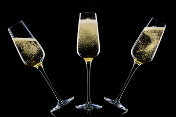 Set of luxury champagne glasses isolated on a black background