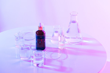 Wall Mural - flask of water olution in science laboratory background