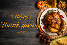 Happy Thanksgiving Holiday Background. Roasted Whole Chicken Or Turkey With Autumn Vegetables For Thanksgiving Dinner On Wooden Background