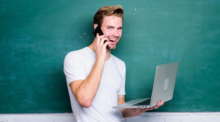 Wall Mural - Advantage mobile internet. Handsome man use modern technologies. Digital concept. Online communications. Digital technology. Digital sciences. Programming web development. School teacher with laptop