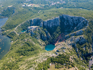 Wall Mural - Red Lake (Crveno jezero) Blue Lake (Plavo jezero) and sourrounding lakes of Imotsko Polje, Croatia are sites of greatest landscape diversity of Europe. 