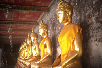 Wall Mural - Ancient golden buddha state at Wat Suthat ,Bangkok ,Thailand