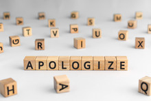 Apologize - Word From Wooden Blocks With Letters, Sorry Concept, Random Letters Around, White  Background