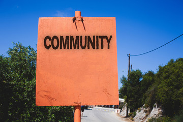 Wall Mural - Conceptual hand writing showing Community. Business photo text Neighborhood Association State Affiliation Alliance Unity Group Wooden board post ideas blue sky trees antique vintage landscape