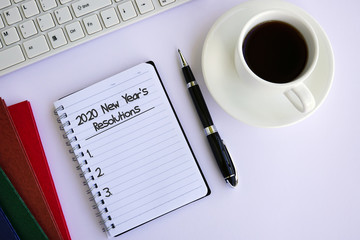 Wall Mural - 2020 New Year's Resolutions text on note pad