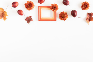 Wall Mural - Autumn creative composition. Flowers, plum, fruit, leaves on white background. Fall, autumn background. Thanksgiving Day concept. Flat lay, top view, copy space