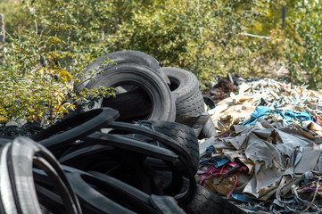 Wall Mural - recycling old car tires landfill rubber waste dump