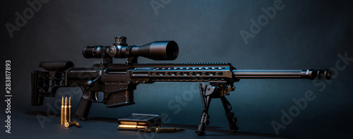 Fotomural Modern powerful sniper rifle with a telescopic sight mounted on a bipod