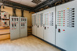 © Mulderphoto - Electrical switchgear cabinets with control panels with indicator lights in factory