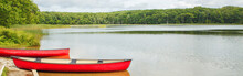 Beautiful Landscape Summer Scene At Canadian Ontario Kettles Lake In Midland Area. Canada Forest Park Nature With Red Kayaks Canoe Boats By Water. Web Banner Header For Website.
