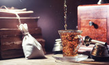 Fototapeta  - Brewing tea on a wooden table