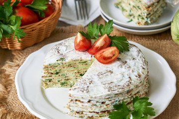 Wall Mural - Zucchini cake with tomatoes and fresh parsley