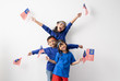 happy excited malaysian kids with malaysia flag over white background