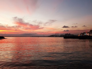 Genova, Italy - 08/12/2019:Sunset horizon sea water landscape. Sunset sea horizon panorama. Orange sunset sea horizon view at sunset