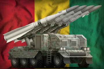 tactical short range ballistic missile with arctic camouflage on the Guinea national flag background. 3d Illustration