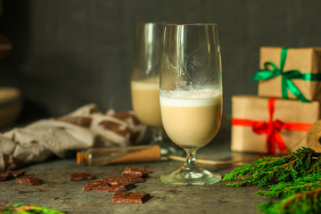 Coffee with milk and gifts on the table - festive atmosphere, (latte) New Year and Christmas. top food background. copy space