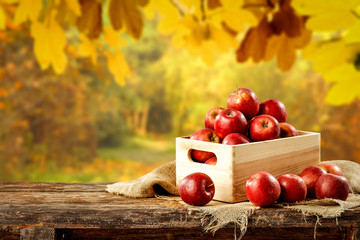 Wall Mural - Fresh red apples in wooden box and free space for your decoration 