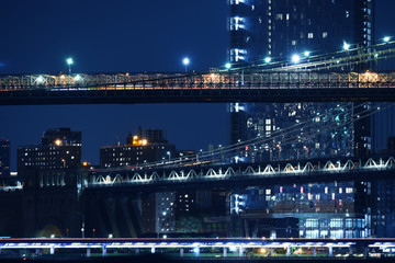 Autocollant - Tiers of bridges over the bay and night skyscrapers. New York. night photo. USA.