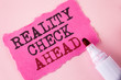 © Artur - Word writing text Reality Check Ahead. Business concept for Unveil truth knowing actuality avoid being sceptical written Tear Pink Sticky note paper Pink background Marker next to it.