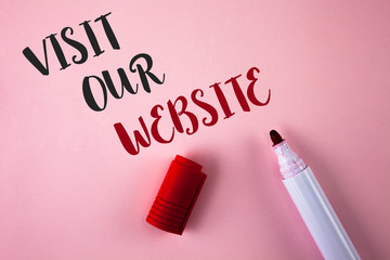 Conceptual hand writing showing Visit Our Website. Business photo showcasing Invitation Watch web page Link to Homepage Blog Internet written Plain Pink background Marker next to it.
