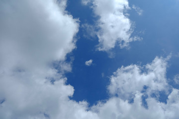 Wall Mural - white clouds with beautiful blue sky background.