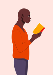 Wall Mural - An African man stands in profile and holds a book in his hands. Guy reading a book. Student in the university library. Vector flat illustration