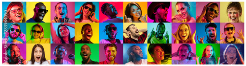 Fotografía Beautiful male and female portrait on multicolored neon light backgroud