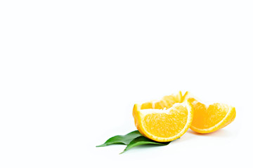 Orange fruits with leaf on isolated white background.