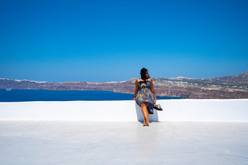 Woman On Vacation In Santorini