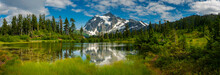 Picture Lake With Mt. Shuksan, Washington State. Picture Lake Is The Centerpiece Of A Strikingly Beautiful Landscape In The Heather Meadows Area Of The Mt. Baker-Snoqualmie National Forest.