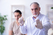 © Elnur - Male patient visitng doctor for shot inoculation