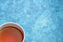 Cup Of Tea On A Blue Bark Paper