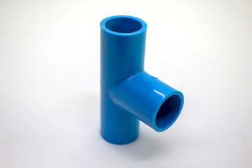 Plastic joints for water pipes on a white background, spare equipment