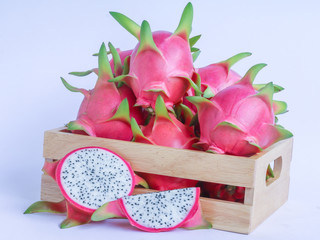 Wall Mural - dragon fruit in basket on white background